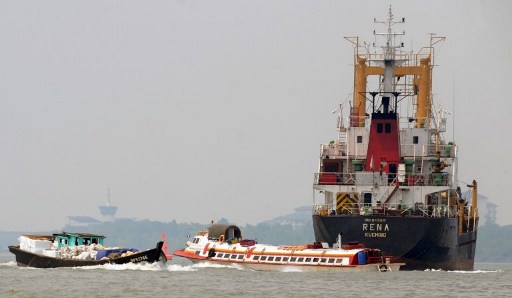 Cargo ships dock at Malaysiau00e2u20acu2122s Klang port on the outskirts of Kuala Lumpur on July 13, 2009. u00e2u20acu201d AFP pic
