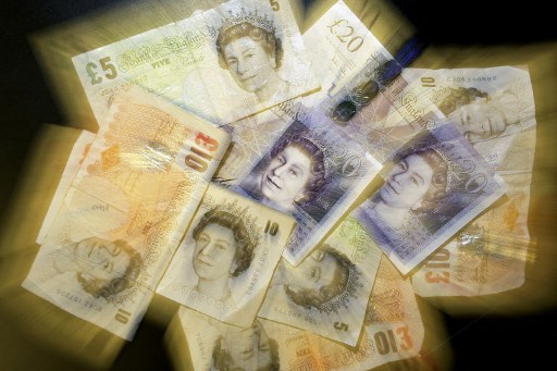 British Sterling pound notes are pictured in London, on December 4, 2008. u00e2u20acu201d AFP pic