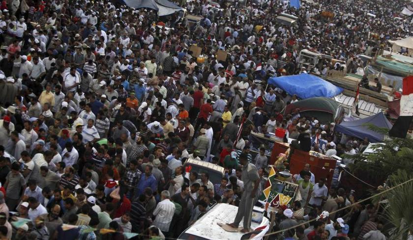 Members of the Muslim Brotherhood and supporters of deposed Egyptian President Mohamed Mursi gather at the Rabaa Adawiya square, where they are camping, in Cairo on July 12, 2013. u00e2u20acu201d Reuters pic