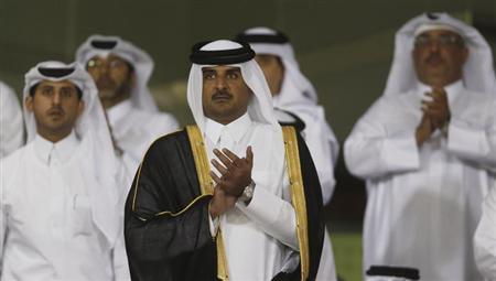 Sheikh Tamim, like his father Sandhurst trained, becomes the youngest monarch among the Gulf states. – Reuters pic