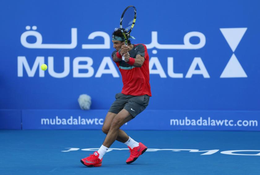 Rafael Nadal of Spain hits a return to compatriot David Ferrer during their semi-final tennis match at the Mubadala World Tennis Championship in Abu Dhabi December 27, 2013. u00e2u20acu2022 Reuters pic