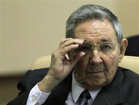 Cuba's President Raul Castro adjusts his glasses during a signing agreement ceremony with Venezuela in Havana April 27, 2013. u00e2u20acu201c Reuters pic