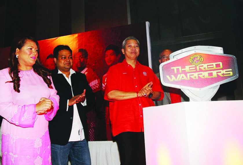 Former Kelantan FA president Tan Sri Annuar Musa launching 'The Red Warriors The Movie' in Petaling Jaya yesterday. u00c2u00adu00e2u20acu201d Picture by Arif Kartono