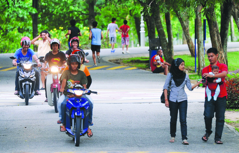 A group of teenagers riding their bikes in the park. u00e2u20acu201d Picture by Shahir Omar