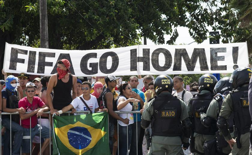 Demonstrators protest near the Estadio Castelao, where the Confederations Cup semi-final match between Spain and Italy is being played, in Fortaleza June 27, 2013. u00e2u20acu201d Reuters pic