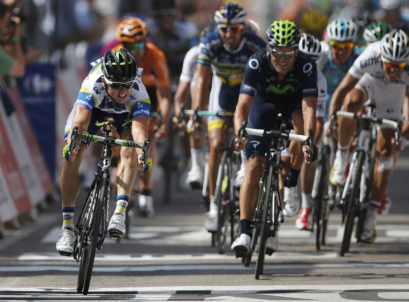 Orica Greenedge team rider Simon Gerrans (L) of Australia sprints to win the 145,5 km third stage of the centenary Tour de France cycling race from Ajaccio to Calvi, on the French Mediterranean island of Corsica July 1, 2013. u00e2u20acu201d Reuters pic