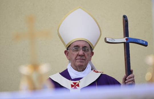 Pope Francis celebrates a mass during his visit at Lampedusa Island, southern Italy, July 8, 2013. u00e2u20acu201d Reuters pic