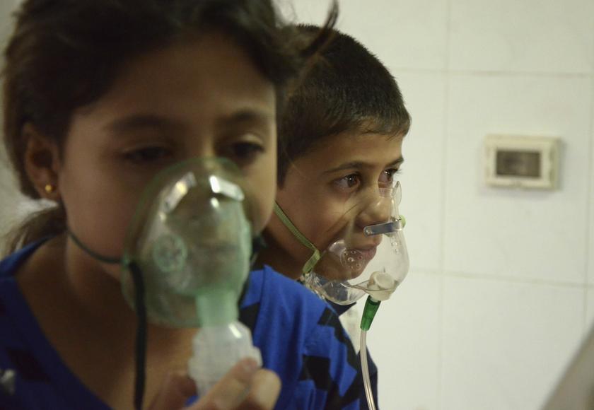 Children, affected by what activists say was a gas attack, breathe through oxygen masks in the Damascus suburb of Saqba, August 21, 2013. u00e2u20acu201d Reuters pic