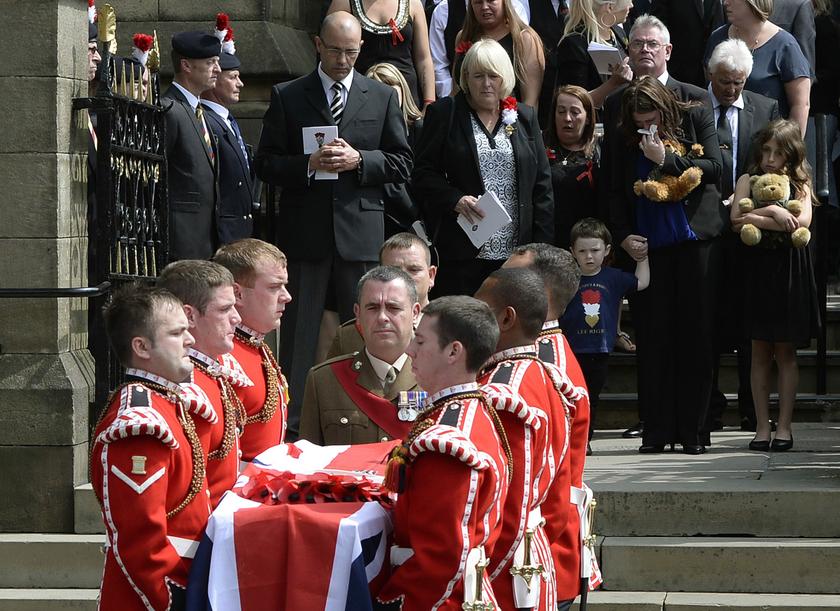 The coffin of Fusilier Lee Rigby is carried by members of his regiment after his funeral service at the parish church in Bury, northern England July 12, 2013. u00e2u20acu201c Reuters pic