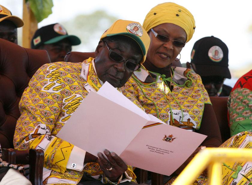 Zimbabwean President Robert Mugabe and his wife Grace attend an election rally of his ZANU-PF party in Marondera, about 70km east of Harare July 15, 2013. u00e2u20acu201c Reuters pic