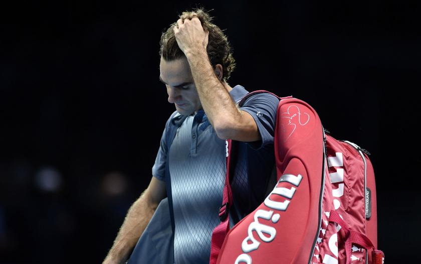 Roger Federer of Switzerland walks off the court after losing to Rafael Nadal of Spain in their men's singles semi-final tennis match at the ATP World Tour Finals at the O2 Arena in London November 10, 2013. u00e2u20acu201d Reuters pic 