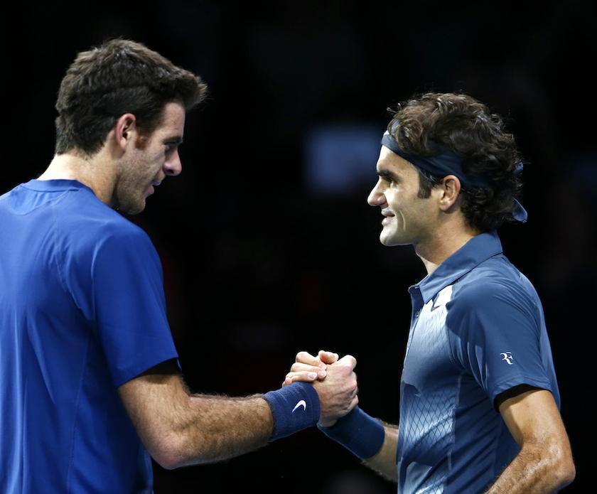 Roger Federer of Switzerland shakes hands with Juan Martin Del Potro of Argentina after winning his menu00e2u20acu2122s singles tennis match at the ATP World Tour Finals at theO2 Arena in London November 9, 2013. u00e2u20acu201d Reuters picn