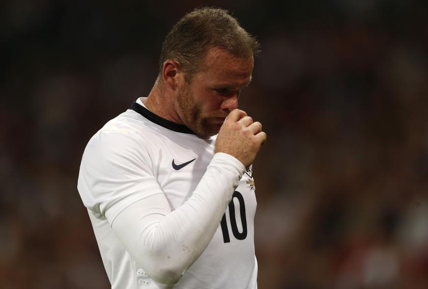 England's Wayne Rooney reacts before being substituted by teammate Rickie Lambert during their international friendly match against Scotland at Wembley Stadium in London, August 14, 2013. u00e2u20acu201c Reuters pic