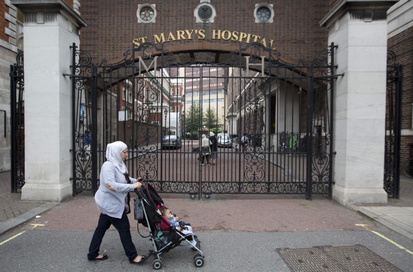 A woman with a pram passes St Mary's Hospital where Catherine, Duchess of Cambridge is due to give birth in London. u00e2u20acu201c Reuters pic 