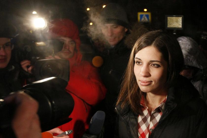 Pussy Riot member Nadezhda Tolokonnikova (R) speaks to the media after she was released from prison in Krasnoyarsk, December 23, 2013 Reuters