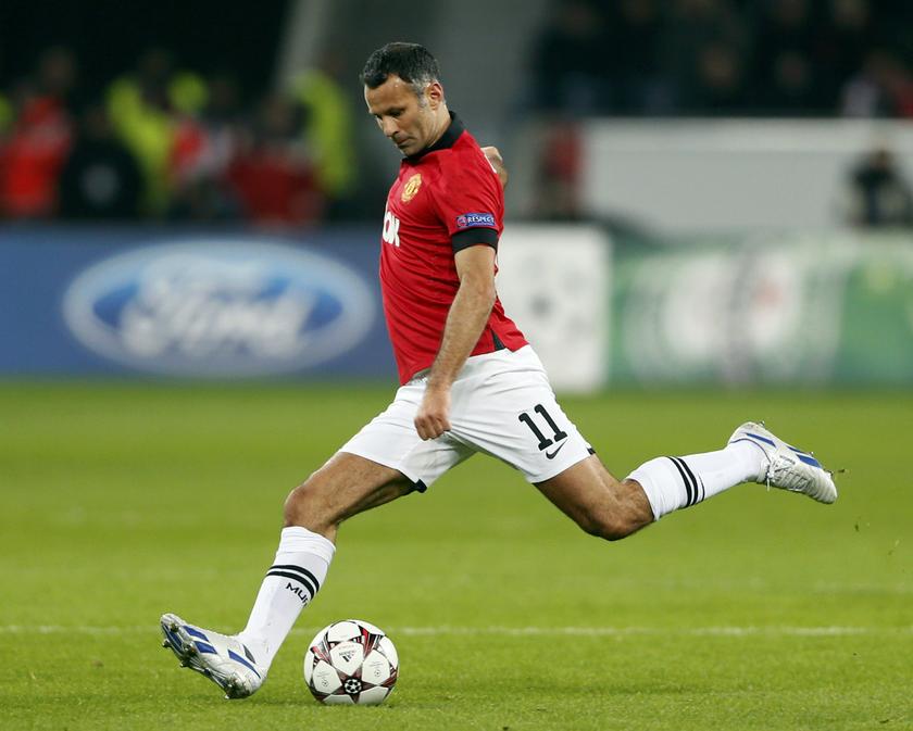 Manchester United's Ryan Giggs kicks the ball during the Champions League Group A match against Bayer Leverkusen at the BayArena in Leverkusen November 27, 2013. u00e2u20acu201d Reuters pic