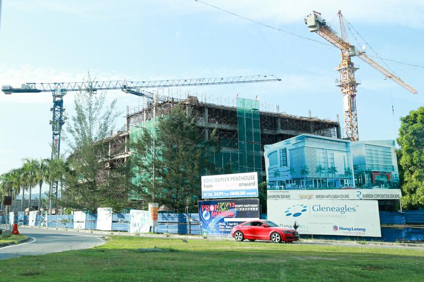 Numerous new developments are coming up along the coast leading up to Kota Kinabalu, Sabah's capital city. u00e2u20acu201d Pictures by Saw Siow Feng