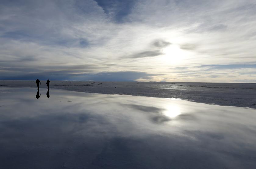 Tourists stand on the Salar salt lake of Uyuni before the seventh stage of the Dakar Rally 2014, that will run from Salta to Uyuni, January 11, 2014. u00e2u20acu201d Reuters pic