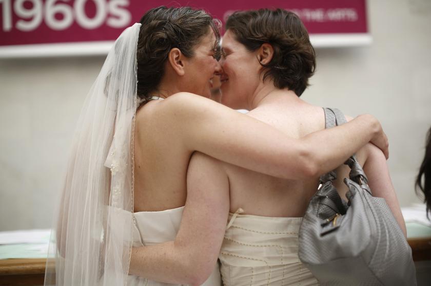 Same-sex couple Cynthia Wides (left) and Elizabeth Carey embrace each other as they turn in their marriage license at City Hall in San Francisco, June 29, 2013. u00e2u20acu201d Reuters pic