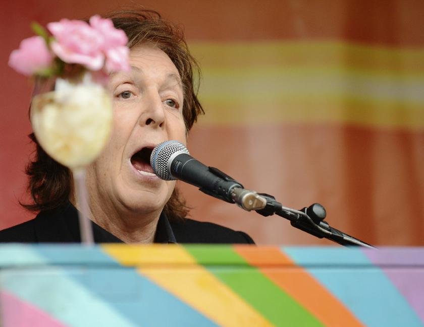 Singer Paul McCartney performs during an impromptu concert to promote his album ,New, at Covent Garden in London October 18, 2013 Reuters pic