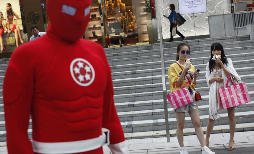 Superhero u00e2u20acu02dcJusticeu00e2u20acu2122at the shopping district of Orchard Road in Singapore October 2, 2013, dishing out lectures on social graciousness a la the Rain City Superhero Movement in Seattle Reuters pic