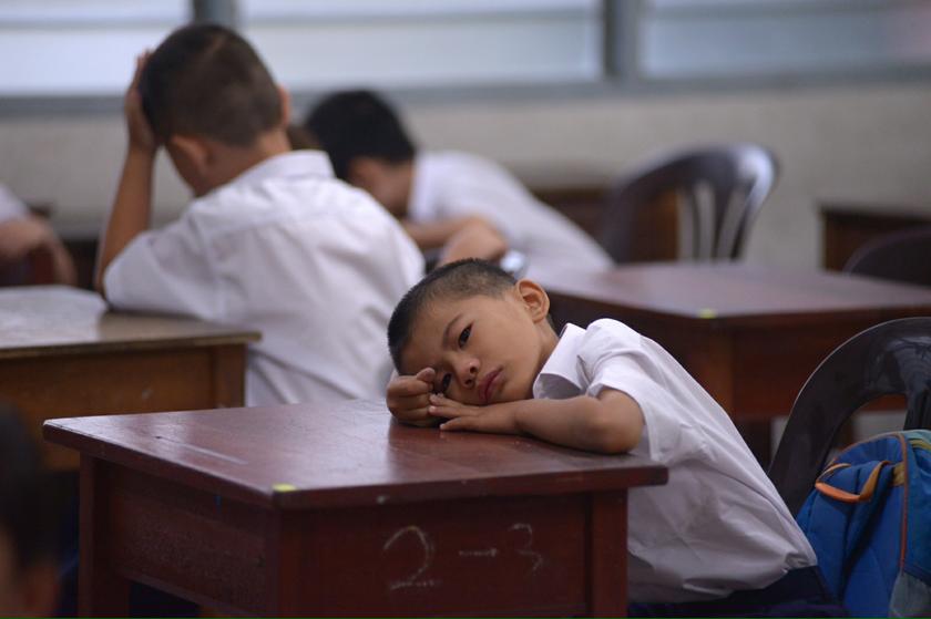 A year 1 student of Sjk Chung Hwa in Penang seem sleepy on his first day of school as today is the first day school reopen in Penang, January 2, 2014. u00e2u20acu201d Picture by K.E. Ooin