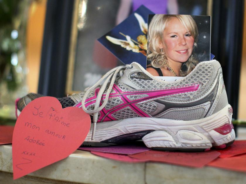 A picture displayed in a running shoe is seen on a memorial inside Sainte-Agnes church in Lac Megantic, July 15, 2013. u00e2u20acu201c Reuters pic