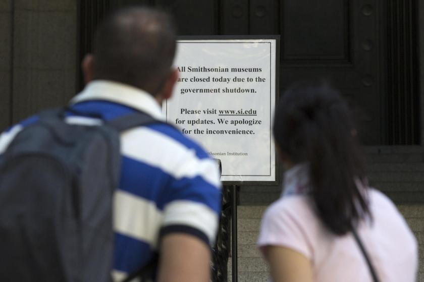 Tourists read a sign informing visitors that all Smithsonian museums are closed due to the government shutdown outside the Smithsonian's National Museum of the American Indian in New York October 1, 2013. u00e2u20acu201du00c2u00a0Reuters pic