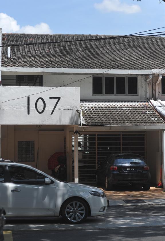 House No 107 in Jalan Telawi has been converted into a handphone accessory and repair shop. — Picture by The Malay Mail
