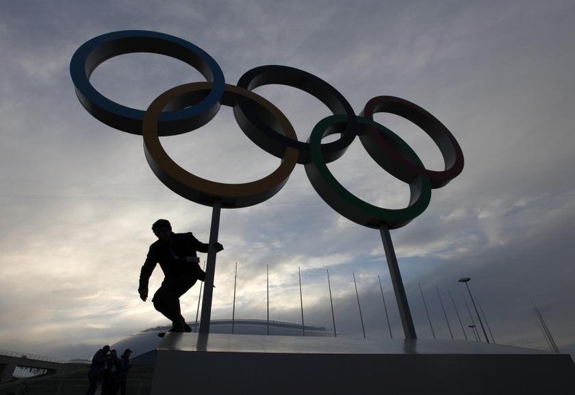A man steps down from a platform displaying the Olympic rings on the Olympic Park as preparations continue for the Sochi 2014 Winter Olympics, January 28, 2014. u00e2u20acu201d Reuters pic