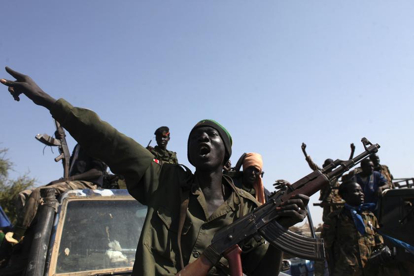 SPLA soldiers sing as they celebrate in Bentiu, Unity state January 12, 2014. u00e2u20acu201d Reuters pic