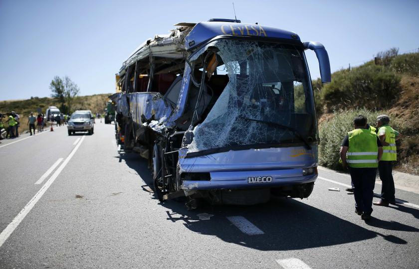 Civil guards inspect the wreckage of a bus crash near Avila, central Spain July 8, 2013. Nine people died and at least five were seriously injured amongst the 25 passengers in the crash. u00e2u20acu201c Reuters pic