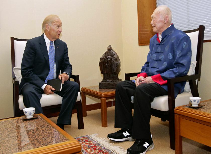U.S. Vice President Joe Biden speaks to former Singapore Prime Minister Lee Kuan Yew (R) during their meeting at the Istana presidential palace in Singapore July 26, 2013