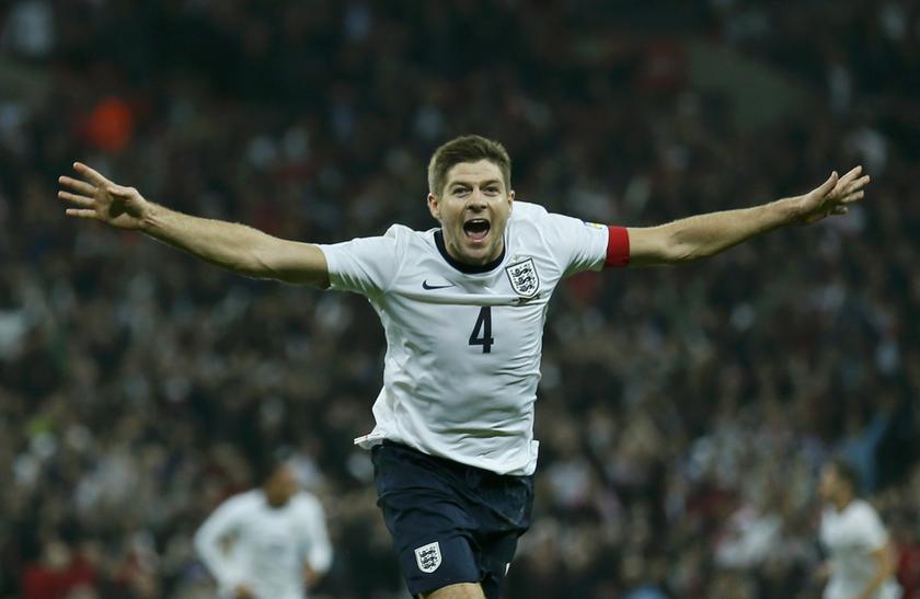 England captain Steven Gerrard celebrates his goal during their 2014 World Cup qualifying  match against Poland at Wembley Stadium in London October 15, 2013.u00c2u00a0u00e2u20acu201du00c2u00a0Reuters pic