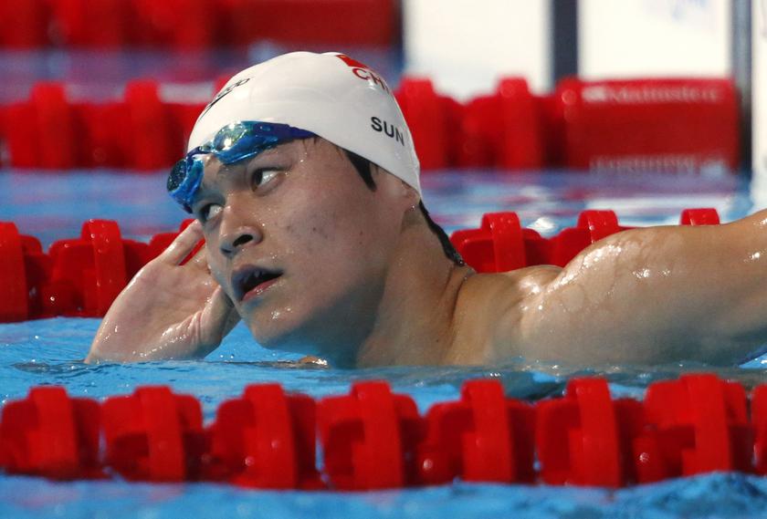 China's Sun Yang reacts after the men's 1500m freestyle heats during the World Swimming Championships at the Sant Jordi arena in Barcelona in this August 3, 2013 file photo. u00e2u20acu201d Reuters pic
