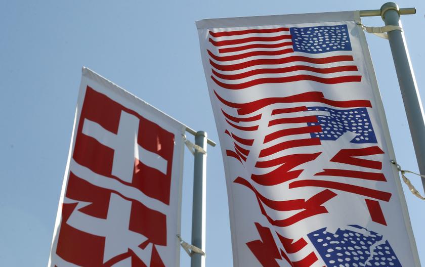 Stylised Swiss and US national flags fly on a roundabout in the town of Obersiggenthal near Zurich May 28, 2013. u00e2u20acu201d Reuters pic