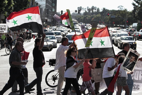 Protesters march on Wilshire Blvd. during an anti-war rally in Los Angeles September 7, 2013. US President Barack Obama appealed yesterday to a dubious US public to back his bid to use military force in Syria. u00e2u20acu201d Reuters pic