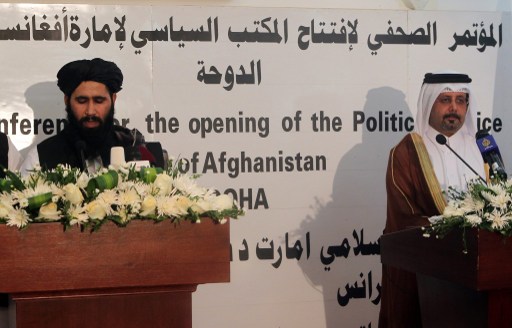 Qatari Assistant Minister for Foreign Affairs Ali bin Fahd al-Hajri (right) and the Talibanu00e2u20acu2122s office spokesman Mohammed Naim speak during a joint press conference at the opening the new Taliban political office in Doha June 18, 2013. u00e2u20acu201d AFP pic