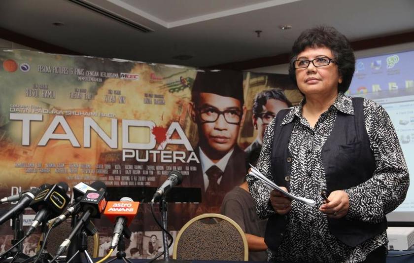 File photo of Datin Paduka Shuhaimi Baba with the poster of u00e2u20acu02dcTanda Puterau00e2u20acu2122 in the background. u00e2u20acu201d Picture by Choo Choy May