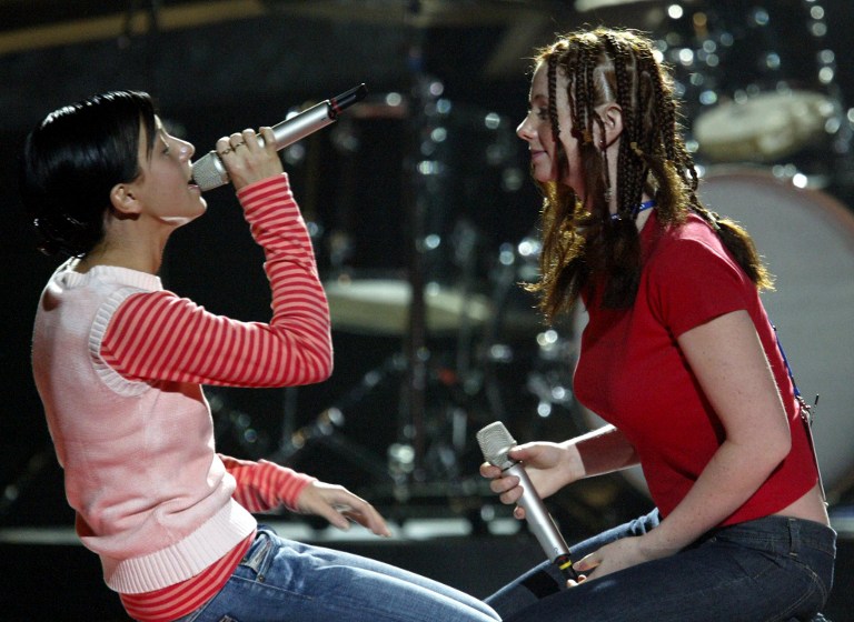 Russian pop group t.A.T.u, Lena Katina (right) and Yulia Volkova, perform during rehearsal 22 May 2003 two days before the Eurovision Song Contest in Riga, Latvia. u00e2u20acu201d AFP pic