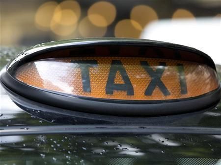 A taxi cab is pictured in London July 20, 2012 Reuters pic