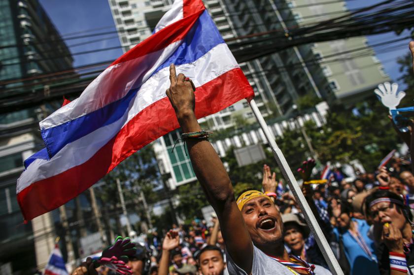 An anti-government protester gestures as he gathers with others outside the headquarters of the ruling Puea Thai Party of Prime Minister Yingluck Shinawatra in Bangkok November 29, 2013. u00e2u20acu201d Reuters pic