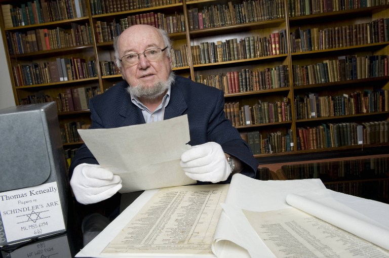 This undated handout photo by State Library of New South Wales received on April 6, 2009 shows Australian author Thomas Keneally at the State Library with Schindler List papers containing the names of 801 Jews saved from the Holocaust. u00e2u20acu201d AFP pic