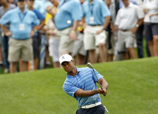 Tiger Woods hits on to the 16th green during the first round of the Barclays PGA golf tournament in Jersey City, New Jersey August 22, 2013. u00e2u20acu201d Reuters pic