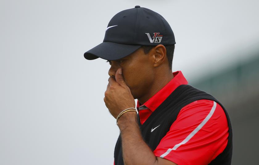 Tiger Woods walks off the first tee during the final round of the British Open at Muirfield in Scotland July 21, 2013. u00e2u20acu201d Reuters pic