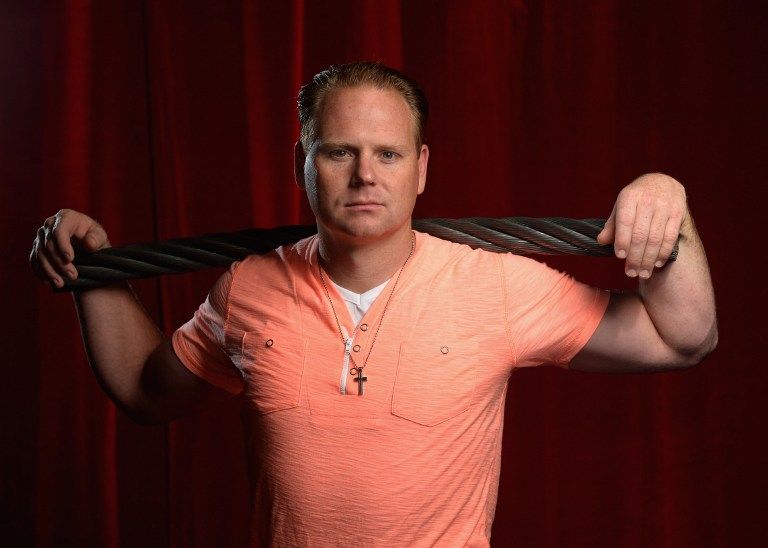 Nik Wallenda poses for a photograph with a piece of the high wire he used to walk over Niagara Falls on at Circus Sarasota on February 15, 2013 in Sarasota, Florida. u00e2u20acu201d Tim Boyles/Getty Images/AFP