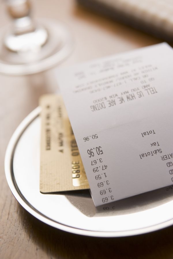 The culture of tipping is predicted to be under increased scrutiny in 2014, says a trendspotting report. u00e2u20acu201d AFP pic