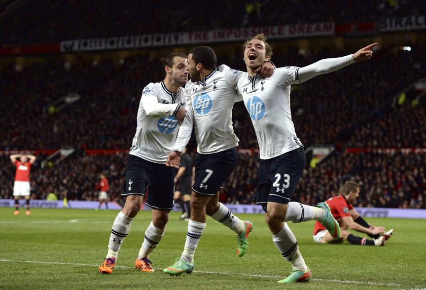 Tottenham Hotspur's Christian Eriksen celebrates his goal against Manchester United with Aaron Lennon and Roberto Soldado during their English Premier League match at Old Trafford in Manchester, northern England January 1, 2014.u00c2u00a0u00e2u20acu201d Reuters pic