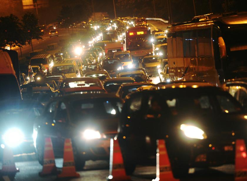 Traffic crawls on Jalan Parlimen after a massive landslide on the Mahameru Highway during evening rush hour on January 7, 2013.