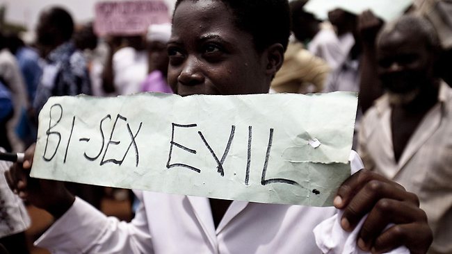 Ugandans take part in an anti-gay demonstration in Kampala. A British man is facing jail time after private photos of him having sex with a local man were published in a tabloid. u00e2u20acu201d AFP pic